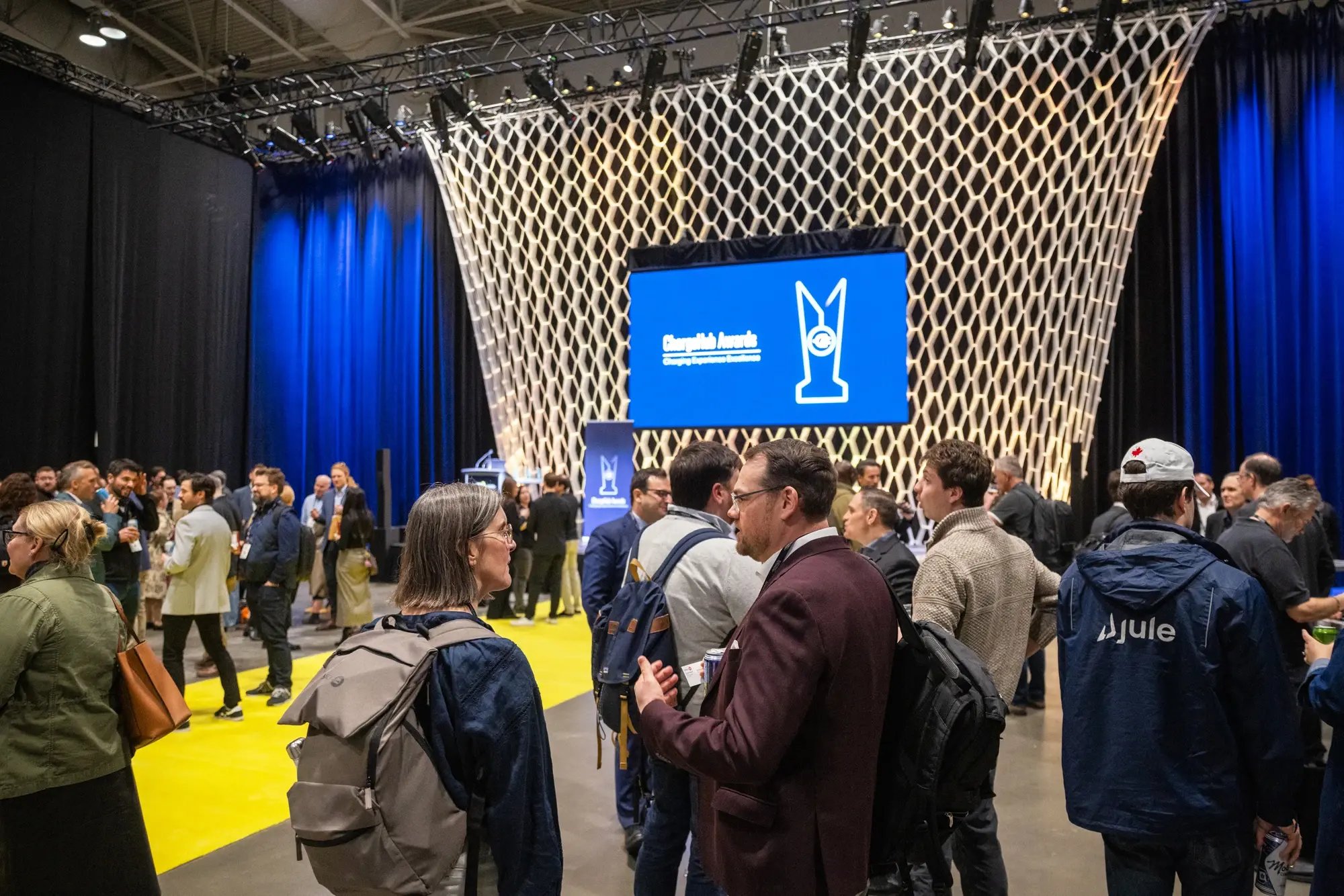 Attendees gather in front of the stage at the ChargeHub Awards ceremony.