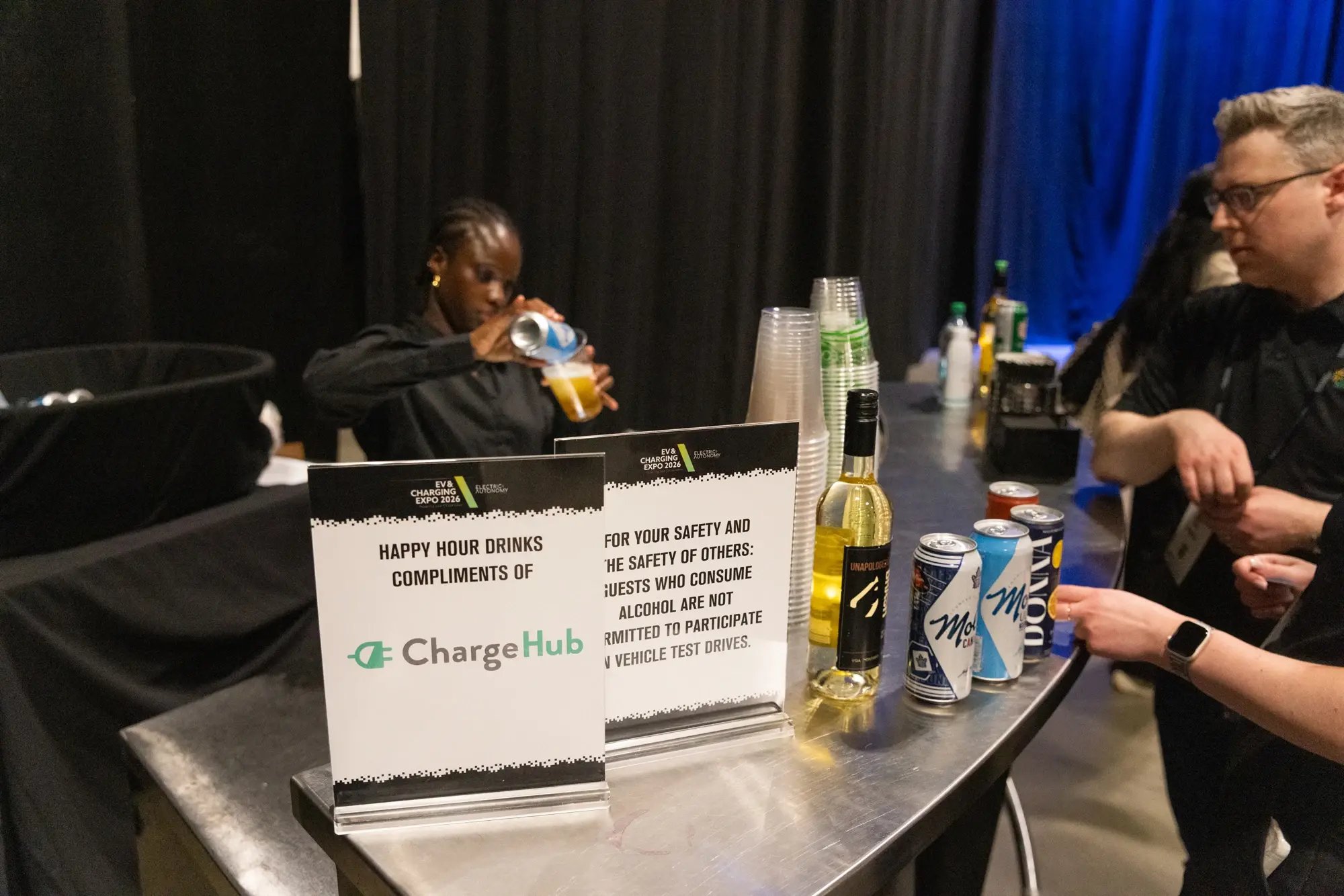 ChargeHub-sponsored drink station at the EV and Charging Expo 2026 happy hour.
