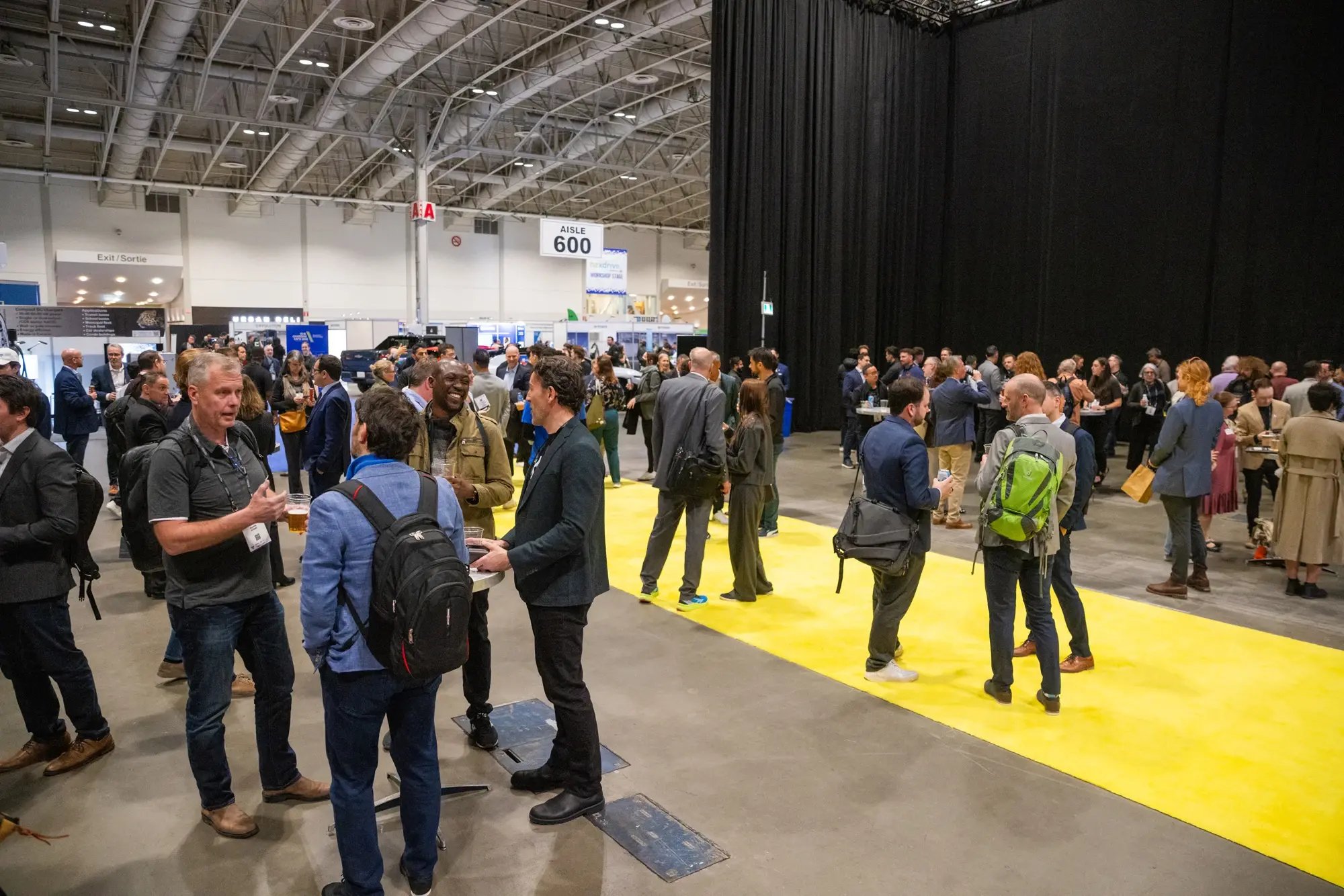 Attendees networking during the ChargeHub Awards reception.
