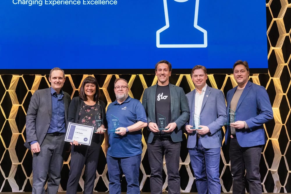 ChargeHub Awards winners pose with trophies and the BC Hydro special recognition certificate.
