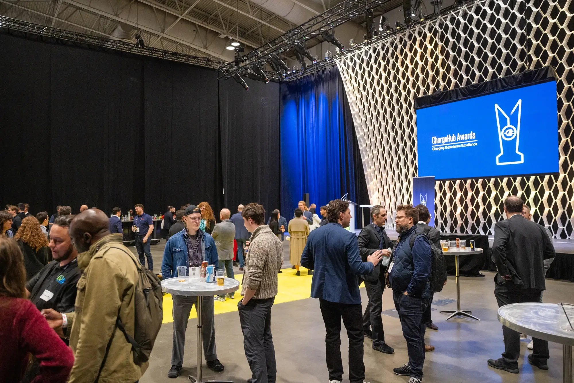 Attendees gather and network in the event space at the ChargeHub Awards ceremony.