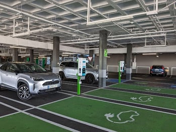 Covered parking for electric vehicles with charging stations
