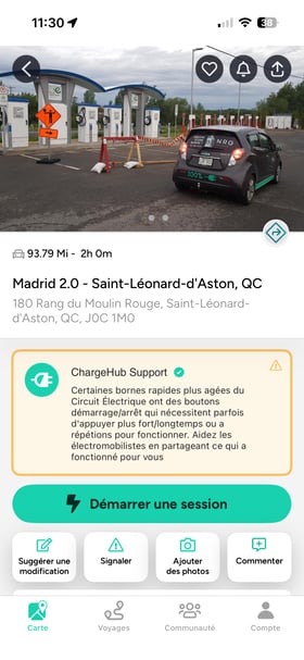EV drivers exchanging information at a charging station